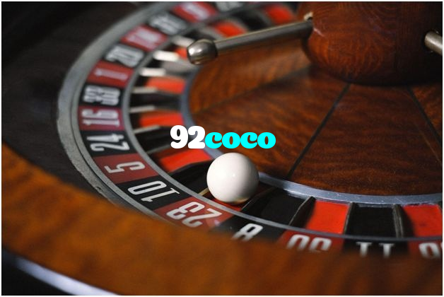 92coco casino presented on mobile device in Pakistan with slots and live games
